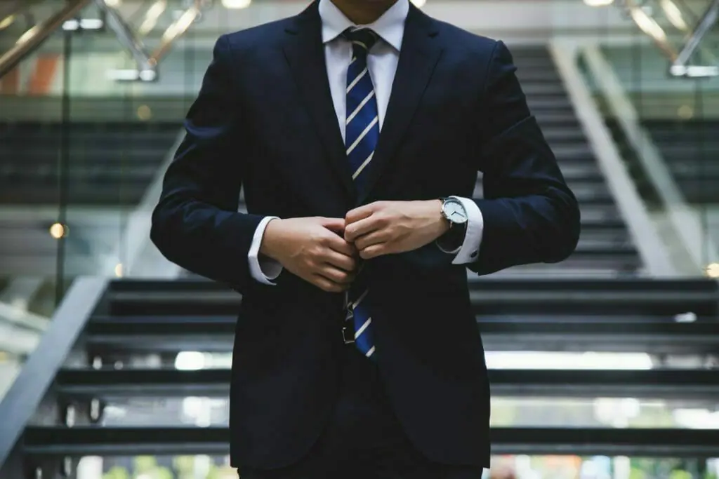 Cancel bank account. Man in suit, with tie